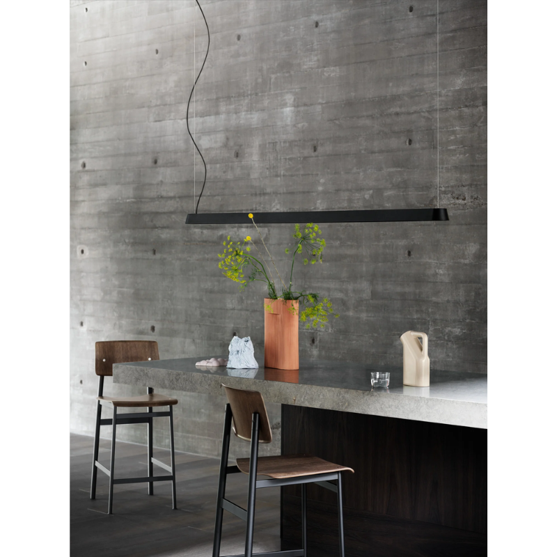 The Linear Pendant Lamp from Muuto in a meeting room.