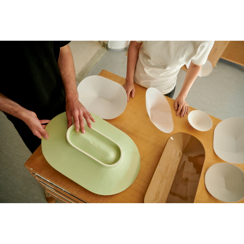 The Mere Bowl from Muuto as part of a dining set.