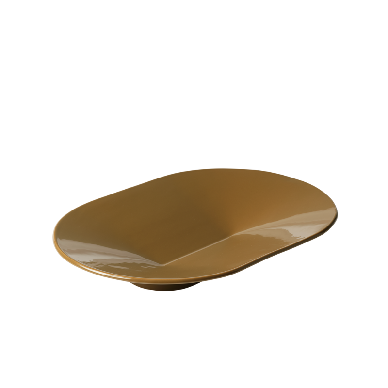 The wide Mere Bowl from Muuto in brown green.