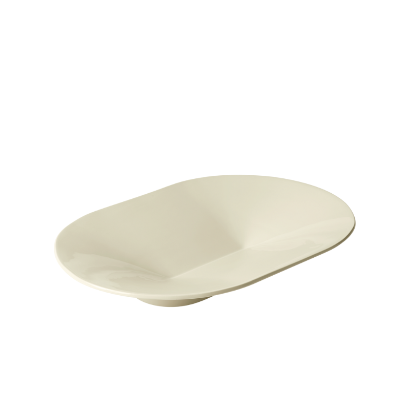 The wide Mere Bowl from Muuto in off white.