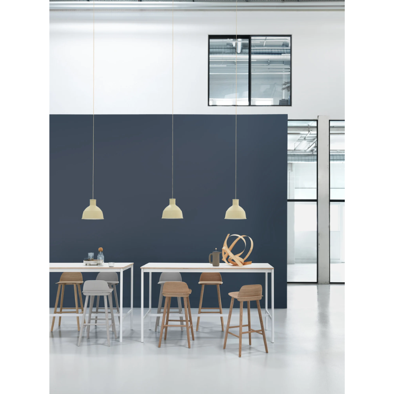 The Unfold Pendant Lamp from Muuto in a commercial space.