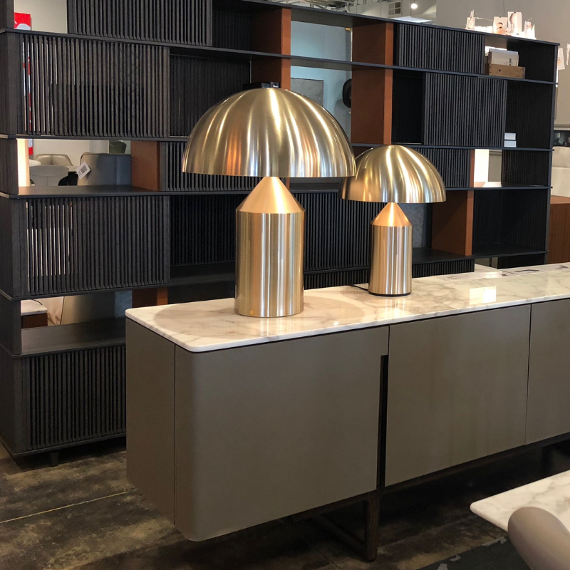 This is the Atollo Gold Table Lamp from Oluce showing the two sizes next to each other.