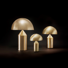 This is the Atollo Gold Table Lamp from Oluce in its three various sizes.