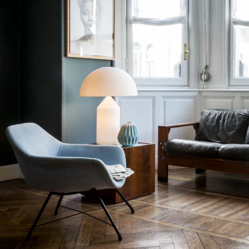 Designed in 1977 by Vico Magistretti, over the years, Atollo has become the archetype of the table lamp, winning the Compasso d Oro in 1979 and completely revolutionizing the way we imagine the classic bedside lamp. The geometric shapes that compose it, cylinder, cone and hemisphere, have resulted in a product that is decorative and essential at the same time, disconnected from the historical period and the fashions of the moment, and one that has now fully become one of the icons of Italian design.