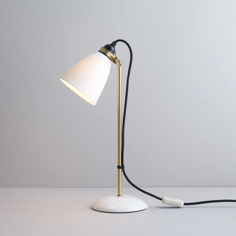 Our classic Hector updated for our 30th Anniversary with beautiful satin brass metal work that compliments the Bone China wonderfully, adding a further touch of warmth to the Hector range. Available as a table, floor light and wall light (with and without a switch) with either black or grey braided cable.