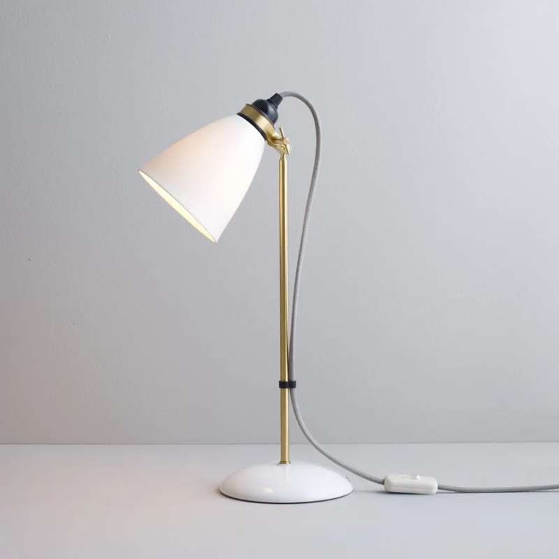 Our classic Hector updated for our 30th Anniversary with beautiful satin brass metal work that compliments the Bone China wonderfully, adding a further touch of warmth to the Hector range. Available as a table, floor light and wall light (with and without a switch) with either black or grey braided cable.