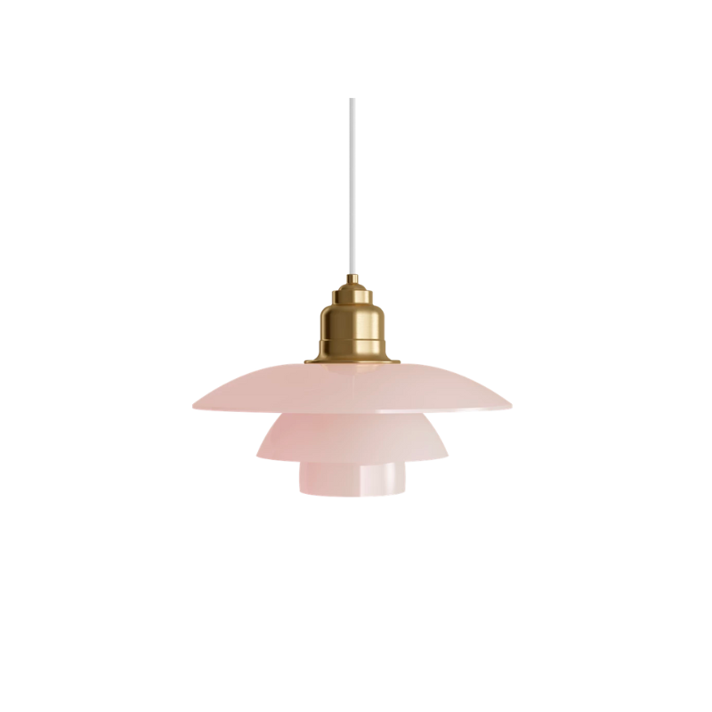 Inspired by Poul Henningsen’s fascination with the interplay between color and light, and the interior trends of today, the PH 3½-3 Pale Rose Brass Pendant features mouthblown pale rose-colored glass shades, which create a whimsical and poetic atmosphere in every room. The elegant expression is enhanced by the brushed brass detailing which, if left untreated, will patinate beautifully over time, giving the lamp character and charm.
