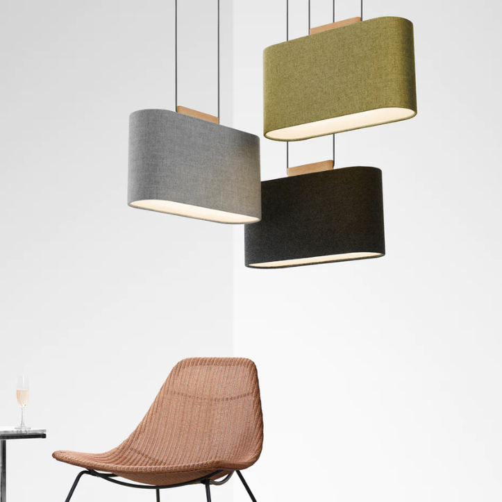 The Belmont Pendant from Pablo Designs in a lifestyle shot showing off the charcoal and silverdale colors. all-groups
