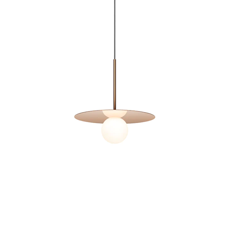 This is a photograph of the 12 inch Bola Disc Pendant from Pablo Designs in rose gold.