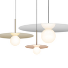 Multiple colors and sizes of the Bola Disc Pendant from Pablo Designs.