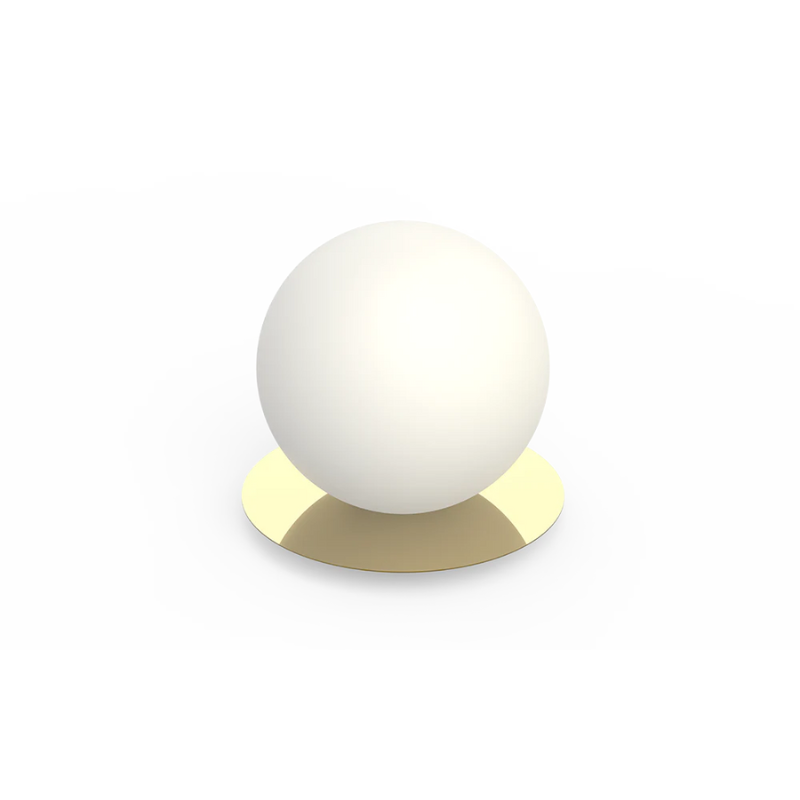 The Bola Sphere Table from Pablo Designs, 10 inch size in brass.