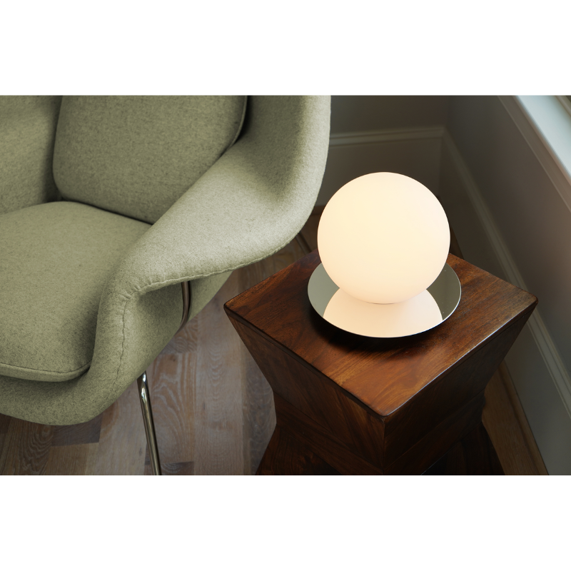 The Bola Sphere Table from Pablo Designs in a living room.