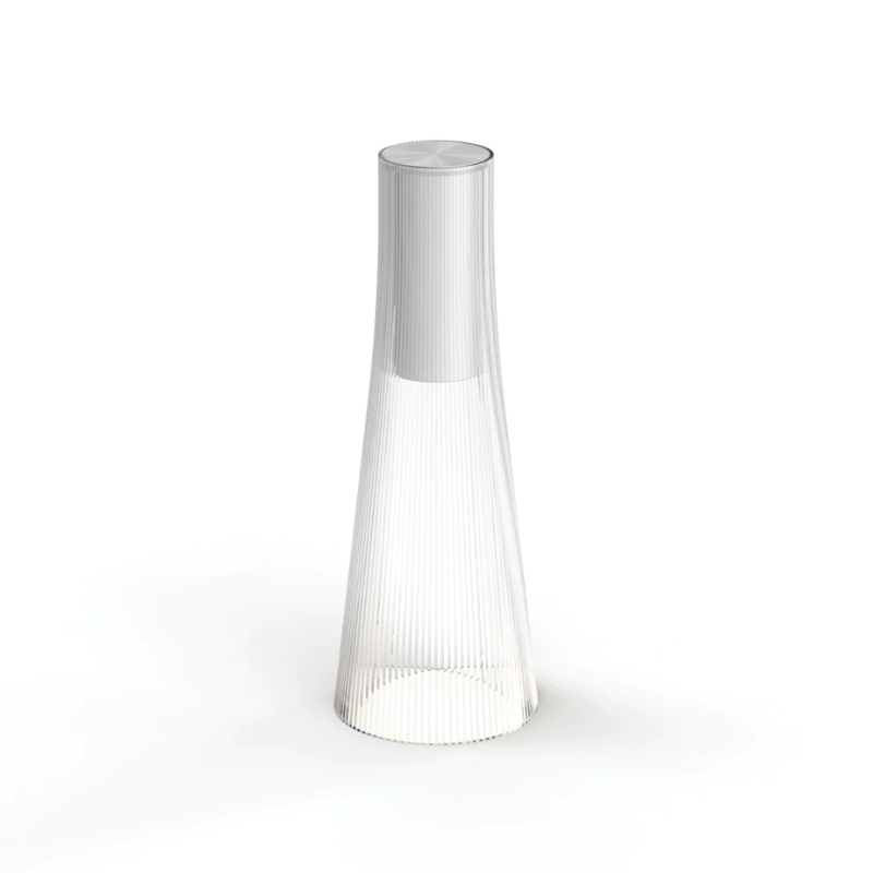 The Candel portable table lamp from Pablo Designs in clear and silver.