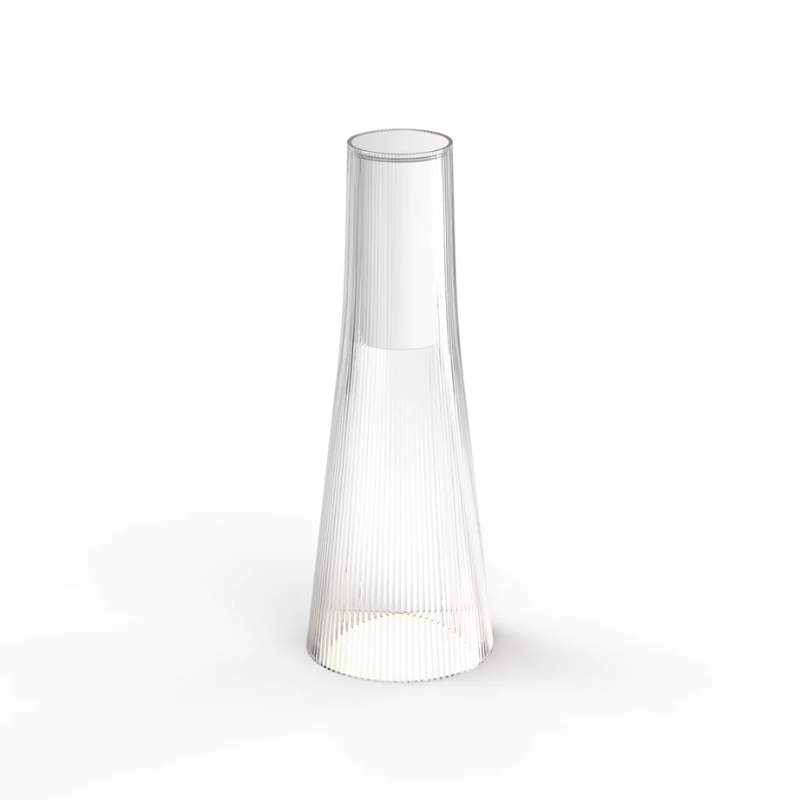 The Candel portable table lamp from Pablo Designs in clear and white.