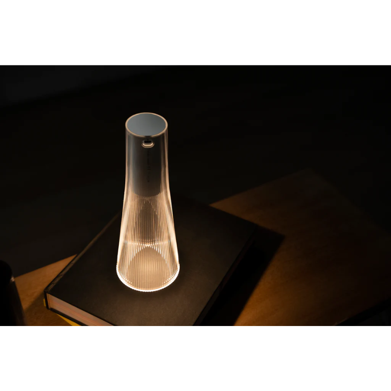 Inspired by a cone of light, Candél’s graceful vessel-like silhouette is in perfect harmony with its surroundings allowing the environment to filter through. Candél casts a warm, intimate candle-like glow that’s sure to seduce and become the central focus of any social gathering. 