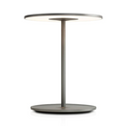 The Circa Table light from Pablo Designs in graphite with the lamp flattened to show the adjustability of the light.