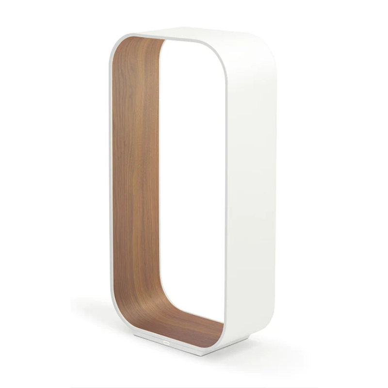 The large version of the Contour Table light from Pablo Designs in white and walnut.