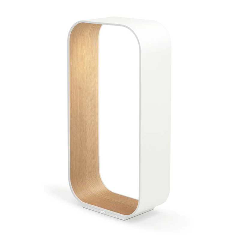 The large version of the Contour Table light from Pablo Designs in white and white oak.