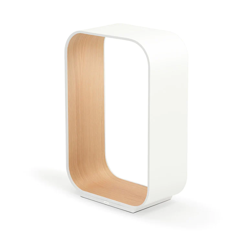 The small version of the Contour Table light from Pablo Designs in white and white oak.