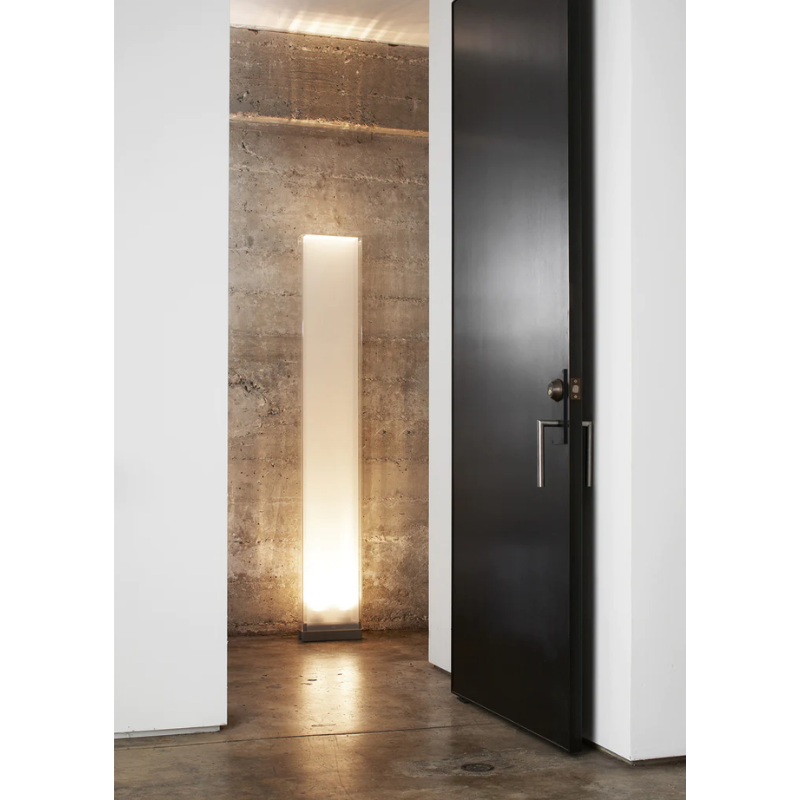 The Cortina Floor lamp in a living room lifestyle shot.