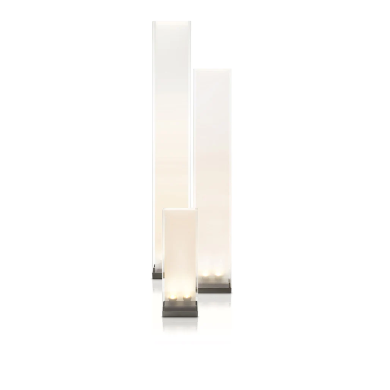 Two of the Cortina Floor lamps with a Cortina table lamp.