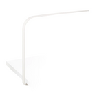 The LIM C under-surface table light from Pablo Designs in white.
