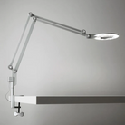 The medium Link Clamp from Pablo Designs in silver mounted to a table. all-groups