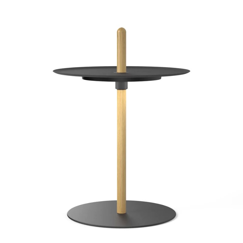 The small Nivél Pedestal from Pablo Designs with the oak post and black tray.