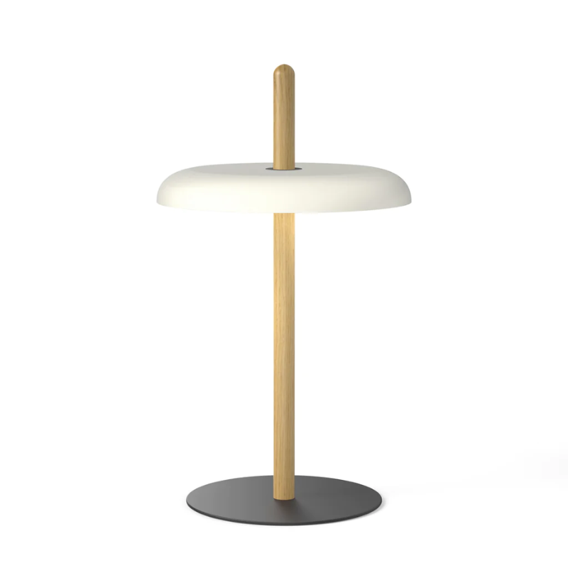 The Nivél Table from Pablo Designs with an oak post and white shade.