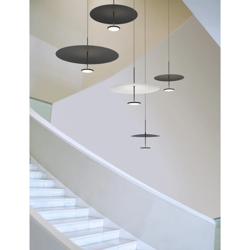 The polished aluminum and black as well as the black and black Sky Dome Metal from Pablo Designs in a living room. all-groups