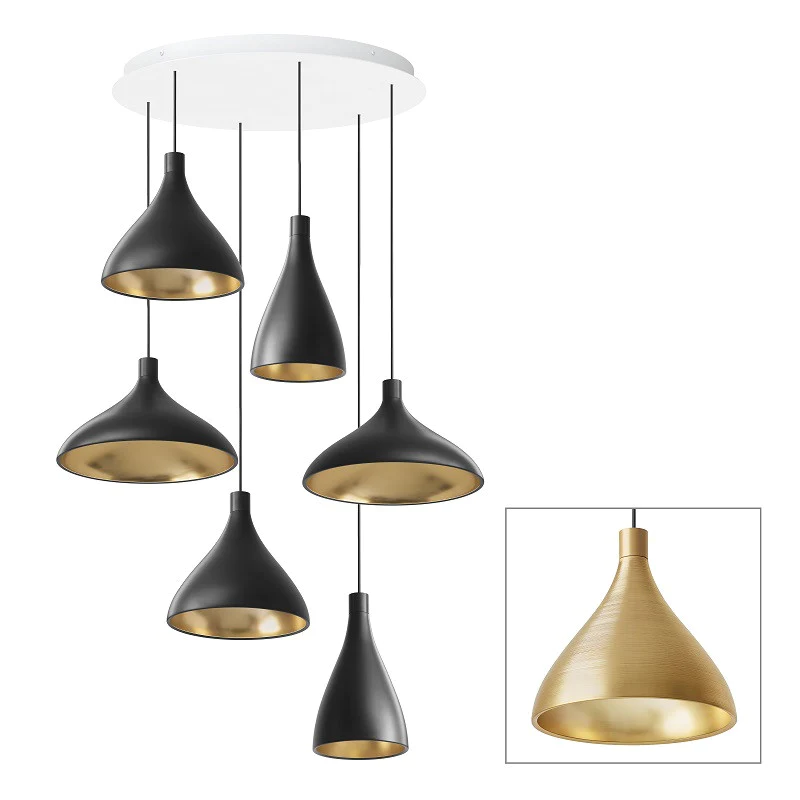 The Swell Chandelier from Pablo Designs with 6 pendants in brass.