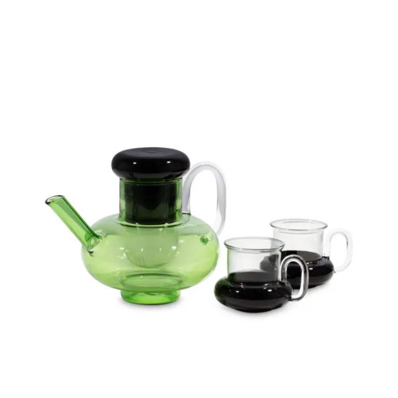 The Bump Tea Pot in Green by Tom Dixon with the set of two Bump Tea Cups in black.