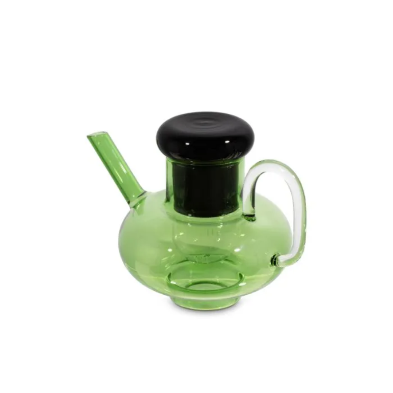 The Bump Tea Pot in Green by Tom Dixon from a side angle.