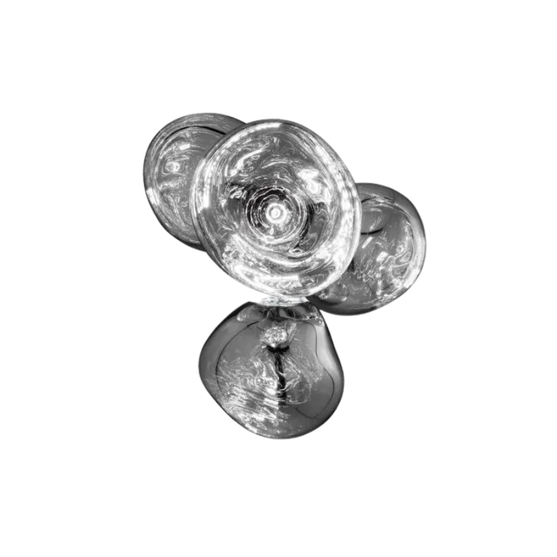 A swarm, huddle, herd, cluster or bunch; there are a thousand ways of configuring our lamps to produce an extraordinary lighting arrangement. The latest additions to Tom Dixon's Melt family includes the Melt Small Chandelier, featuring four orbs protruding from polished tubes and measuring one meter high. Fitted with their new LED module, Tom Dixon's Melt Chandeliers are an attempt to rethink the contemporary chandelier.