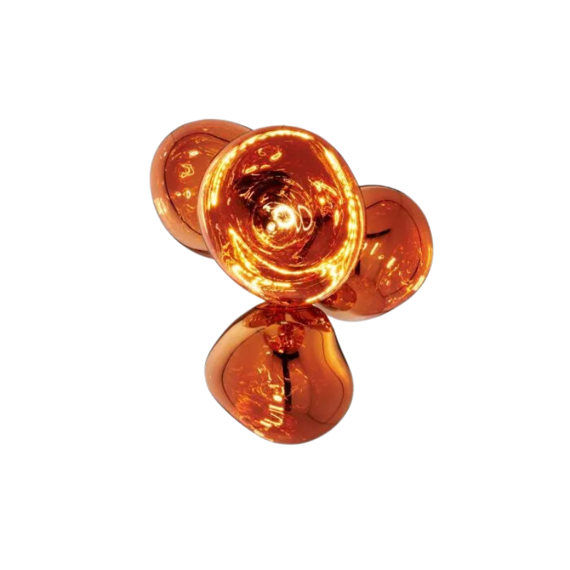A swarm, huddle, herd, cluster or bunch; there are a thousand ways of configuring our lamps to produce an extraordinary lighting arrangement. The latest additions to Tom Dixon's Melt family includes the Melt Small Chandelier, featuring four orbs protruding from polished tubes and measuring one meter high. Fitted with their new LED module, Tom Dixon's Melt Chandeliers are an attempt to rethink the contemporary chandelier.