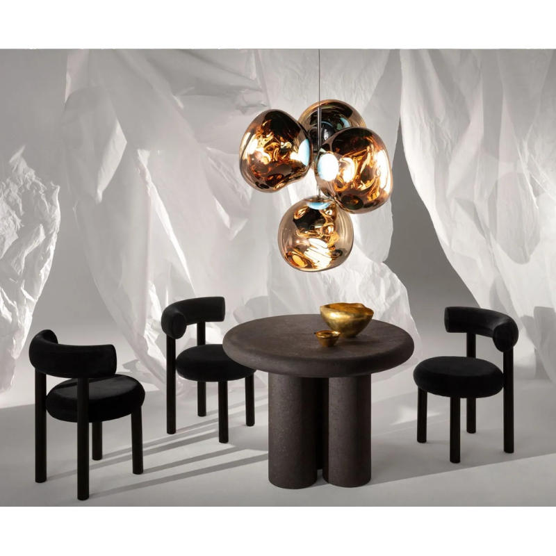 A swarm, huddle, herd, cluster or bunch; there are a thousand ways of configuring our lamps to produce an extraordinary lighting arrangement. The latest additions to Tom Dixon's Melt family includes the Melt Small Chandelier, featuring four orbs protruding from polished tubes and measuring one meter high. Fitted with their new LED module, Tom Dixon's Melt Chandeliers are an attempt to rethink the contemporary chandelier.