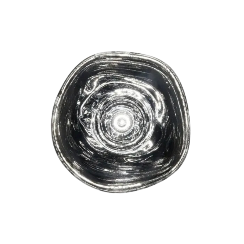 Tom Dixon's Melt LED Surface Wall Sconce is a beautifully distorted pendant in collection of modern finishes with matching ceiling rose. Featuring an integrated LED module, this ceiling light creates a mesmerizing melting hot-blown glass effect when turned on, and a mirror-finish effect when off. This piece is made in Germany using a high tech manufacturing techniques to achieve the perfect melted orb for your design.