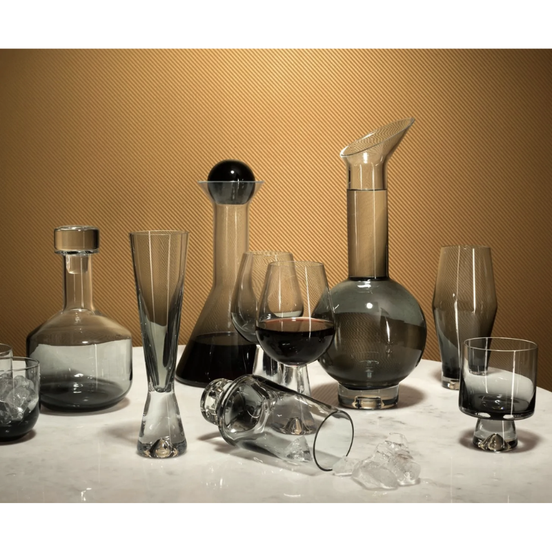 The Tank Wine Glass in black from Tom Dixon with all the other Tank Black barware in the collection.