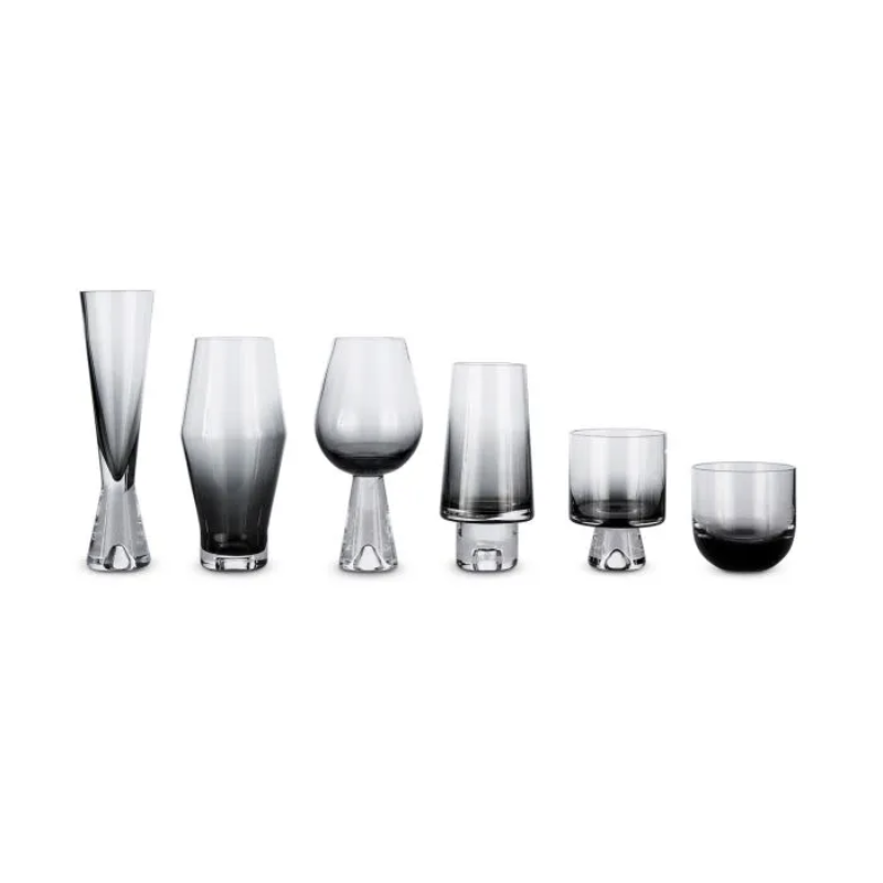 The Tank Wine Glass in black from Tom Dixon alongside the rest of the Tank family.