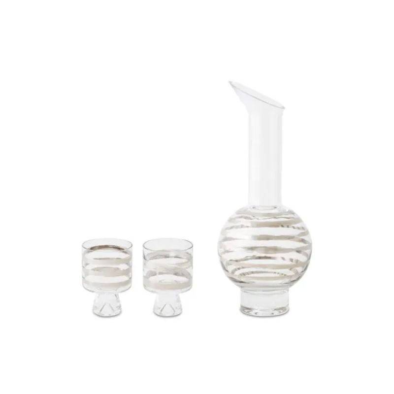 The Twenty Tank Water Set from Tom Dixon featuring two low ball glasses and a decanter.