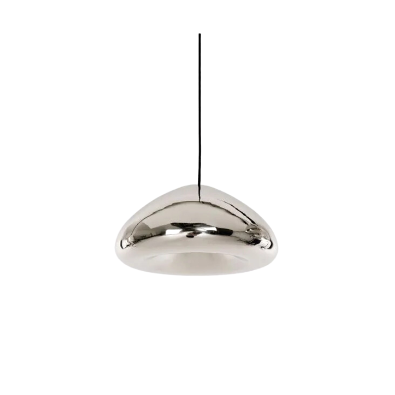 The process of creating Tom Dixon's Void is complex. Cut from a sheet of pure metal, each light is then pressed and spun, and brazed at the end to form a double-walled shade. The high-shine reflectivity achieved with lathing, polishing and caring for the base metals is a bold finish that carries across the Void collection.