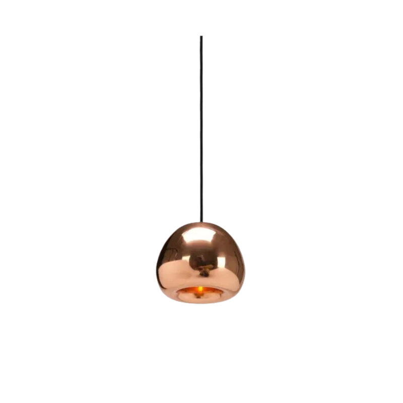 The process of creating Tom Dixon's Void is complex. Cut from a sheet of pure metal, each light is then pressed and spun, and brazed at the end to form a double-walled shade. The high-shine reflectivity achieved with lathing, polishing and caring for the base metals is a bold finish that carries across the Void collection.