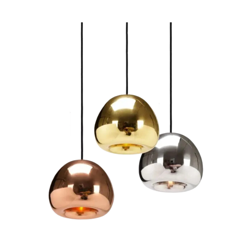The process of creating Tom Dixon's Void is complex. Cut from a sheet of pure metal, each light is then pressed and spun, and brazed at the end to form a double-walled shade. The high-shine reflectivity achieved with lathing, polishing and caring for the base metals is a bold finish that carries across the Void collection.
