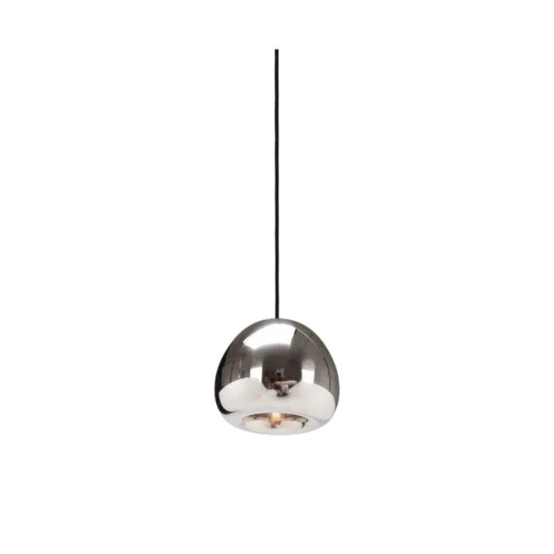 The process of creating Tom Dixon's Void is complex. Cut from a sheet of pure metal, each light is then pressed and spun, and brazed at the end to form a double-walled shade. The high-shine reflectivity achieved with lathing, polishing and caring for the base metals is a bold finish that carries across the Void collection.