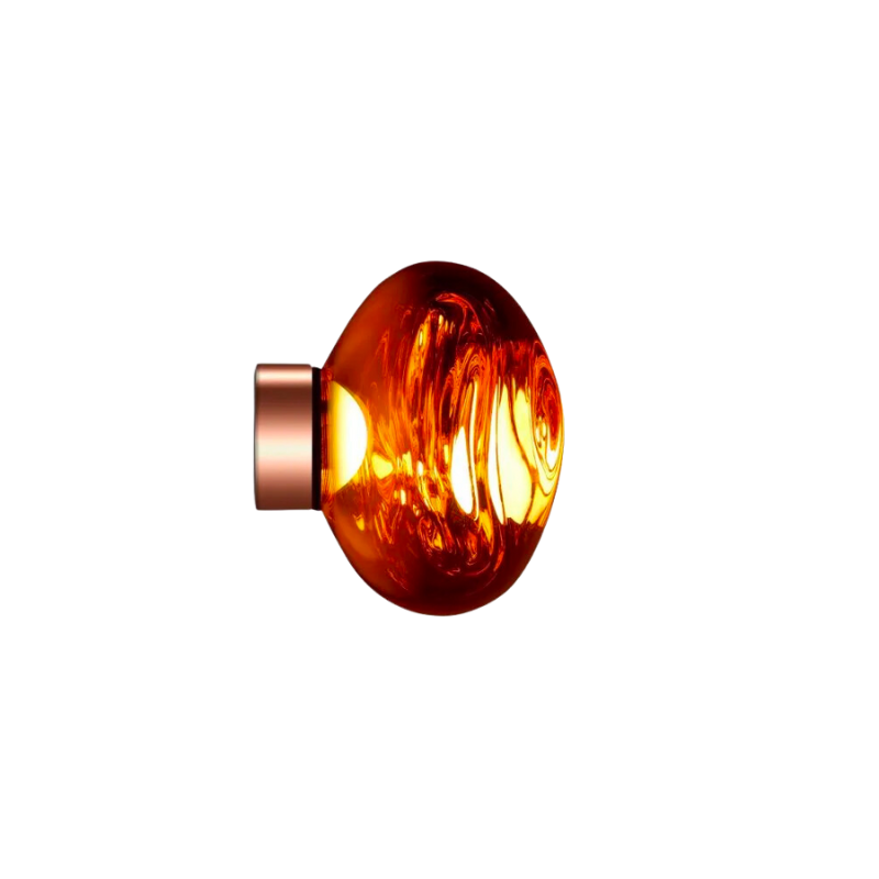 Tom Dixon's Melt is a beautifully distorted pendant in a modern Copper, Gold, Smoke and Chrome finishes and matching ceiling canopies. Featuring our integrated LED module, this ceiling light creates a mesmerizing melting hot-blown glass effect when on and a mirror-finish effect when off. Made in Germany using a high tech manufacturing technique to achieve the perfect melted orb.