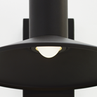The Ash Dome Outdoor Wall Sconce from Visual Comfort and Co. in a studio close up shot.
