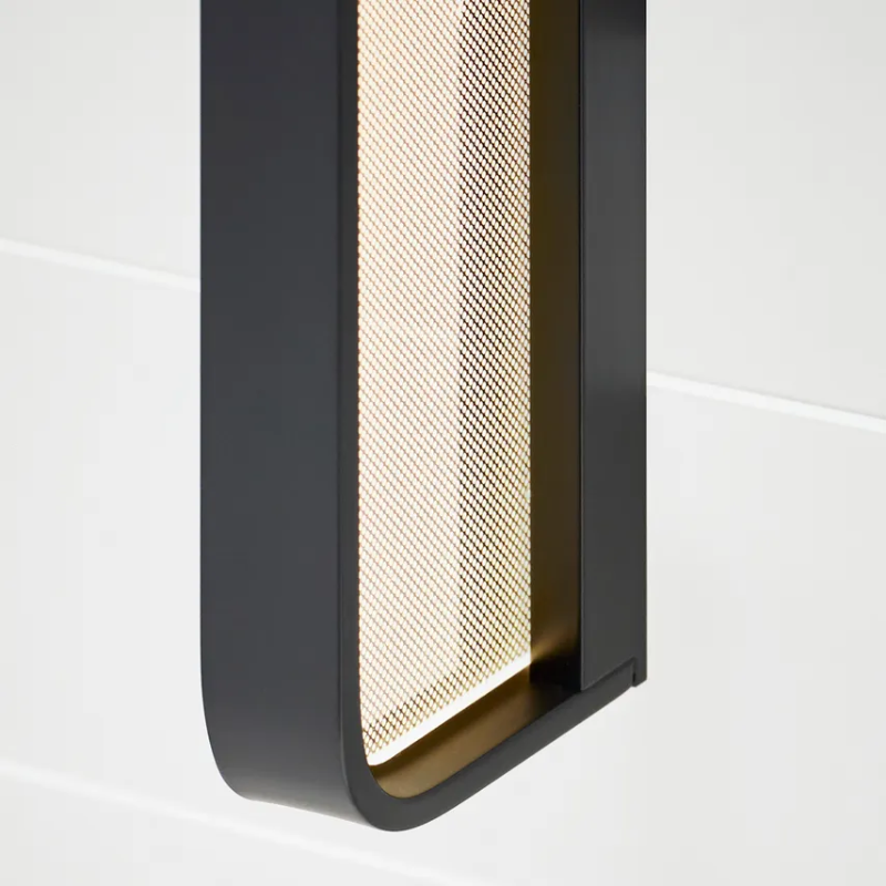 The Banda Bathroom Sconce from Visual Comfort & Co. in a close up shot.