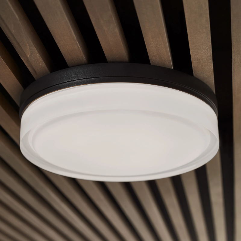 The Cirque Outdoor Flush Mount from Visual Comfort and Co being used as a ceiling light.