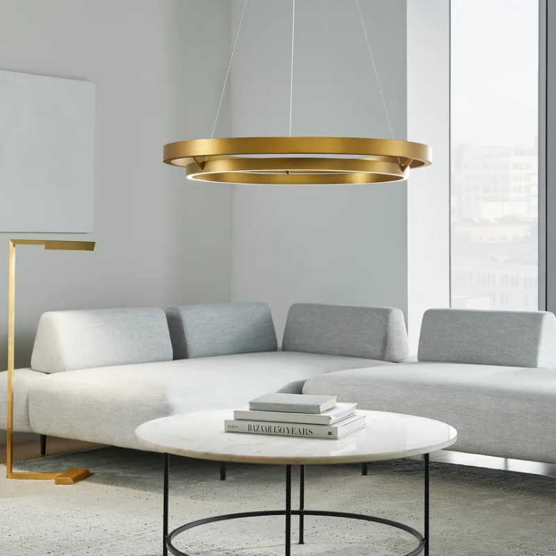 The Grace Chandelier by Sean Lavin is designed with two rings that illuminate this contemporary chandelier. A large outer ring provides organic texture while complemented by a decorative inner ring, housing gently diffused upward and downward LEDs.