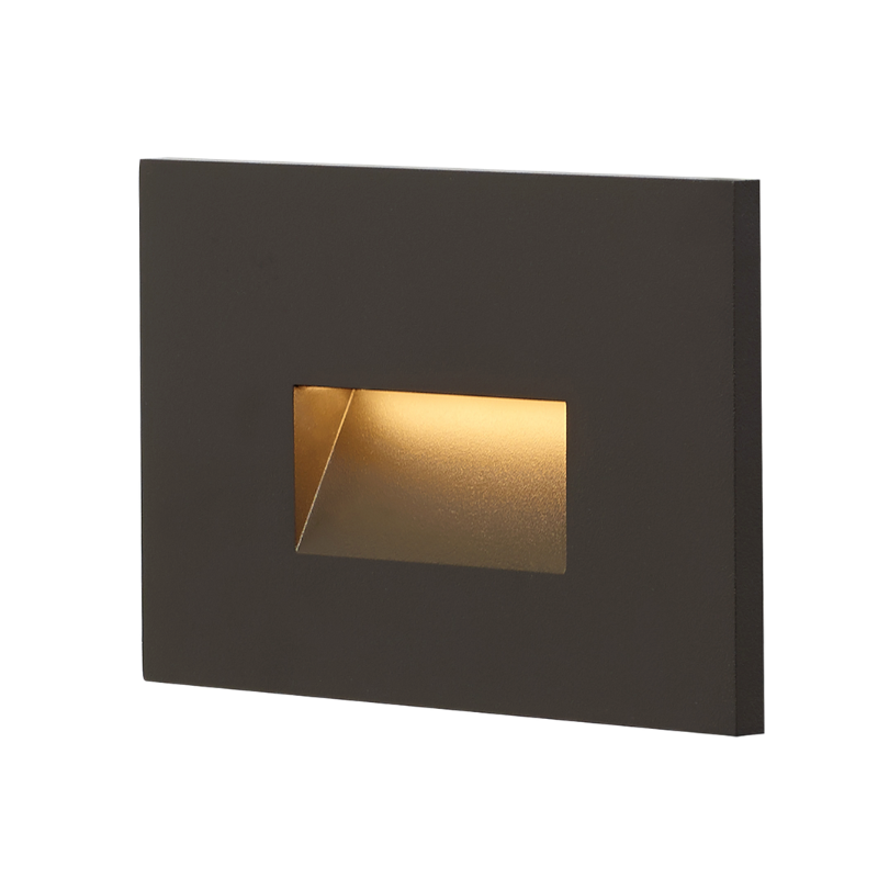 The Ikon Outdoor Step Light from Visual Comfort and Co in bronze.